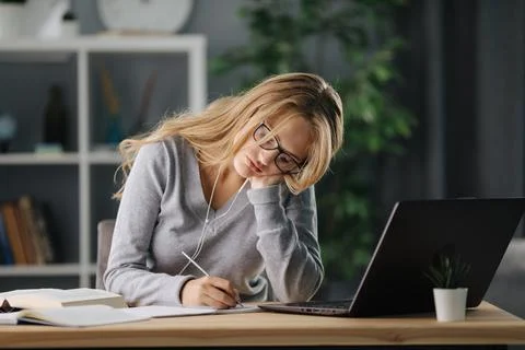 Student using laptop at home Stock Photos