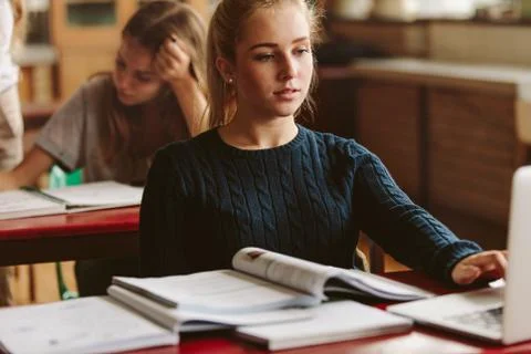 Student using laptop for studies in class Stock Photos