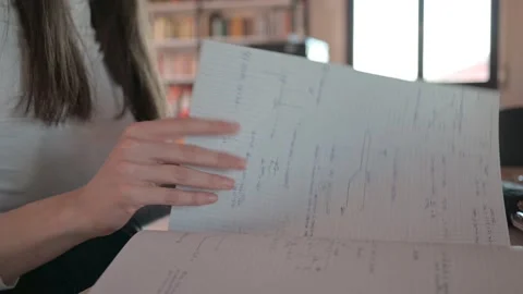 Student using a notebook and studying math Stock Footage 172268472