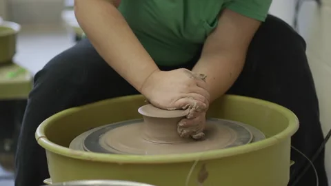 Student using pottery wheel 02 Stock Footage 134207622
