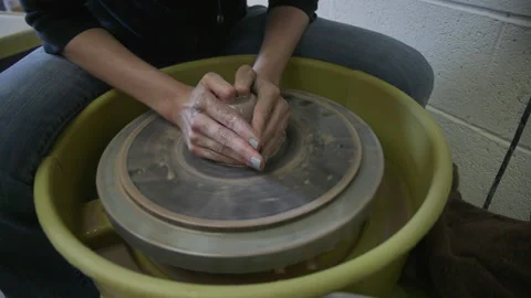 Student using pottery wheel 03 Stock Footage 134207703