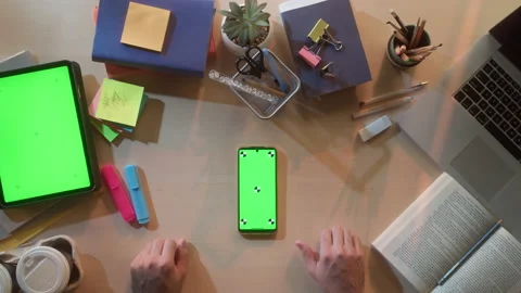Student using smartphone with chroma key screen top view. Business person Vídeo Stock 182022642