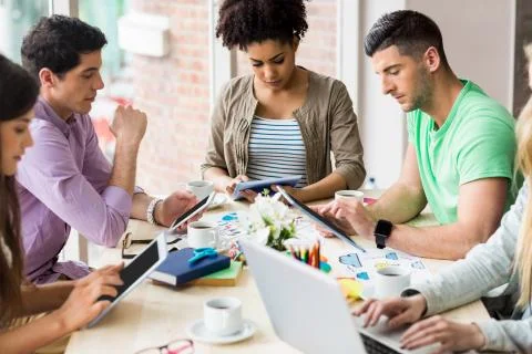 Student using tablet working on assignment Stock Photos