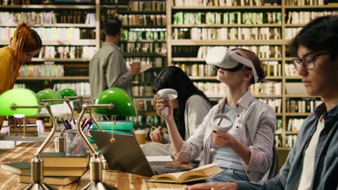 Student using VR device and controller to explore immersive learning Stock Footage 336358768