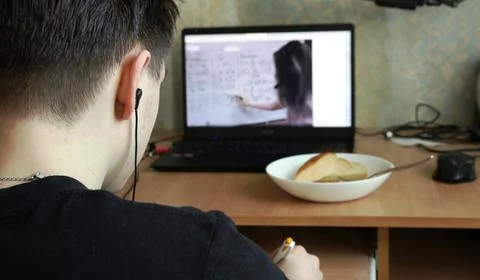 Student video lesson at home using laptop Stock Photos