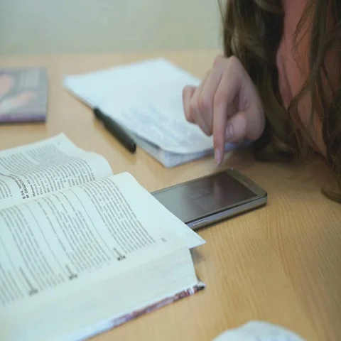 The student views the photos using a mobile phone Stock Footage 69298689
