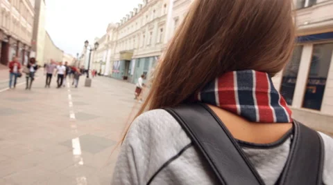 Student walking with a backpack on metropolis Stock Footage 68845528