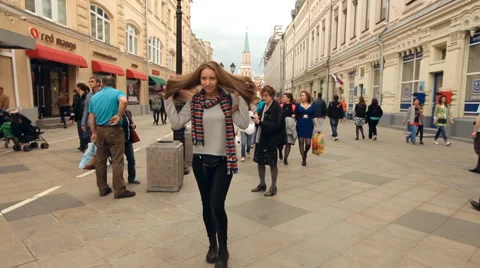 Student walking with a backpack on metropolis Stock-Footage 68846621