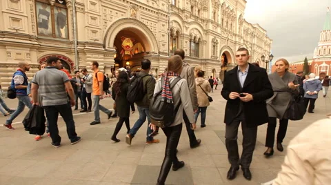 Student walking with a backpack on metropolis Stock Footage 68848336