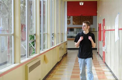 Student walking in hallway Stock Photos