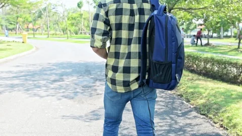 Student walking in park. Stock Footage 92273108
