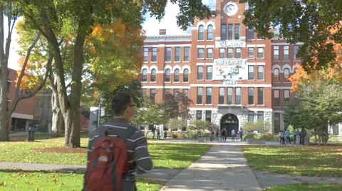 Student Walking on Path to College Stockbeeldmateriaal 54051480