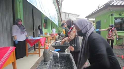 STUDENT WASH THEIR HAND FOR STUDY IN PANDEMIC ERA Stock Footage 151823249