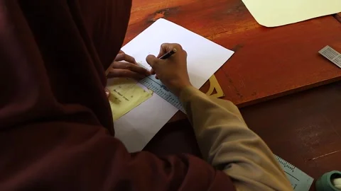 A student wearing a hijab Stock Footage 243626947