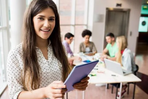 Student working on assignment with tablet Foto stock