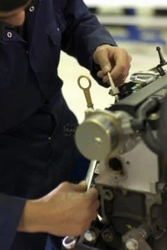 Student working on car engine 写真素材