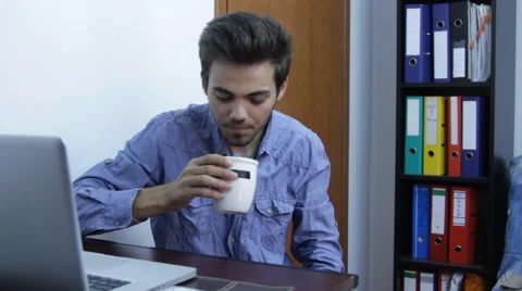 Student Working In Internship, Having A Sip Of Coffee, Young, Business, Front Stock Footage 41393486