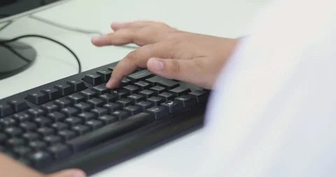 Student working on keyboard computer take2 库存影片 92499645