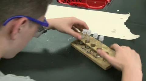 Student working on lab project in Science class (4 of 12) Video stock 10387341