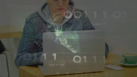 Student working on laptop, casting binary digits and light streaks across Stock Footage 332685823