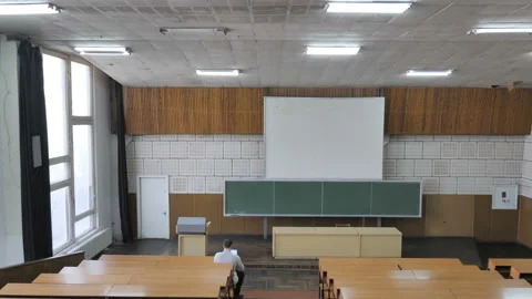 The Student Working On Laptop In Empty Lecture Room.  Stock Footage 127650070