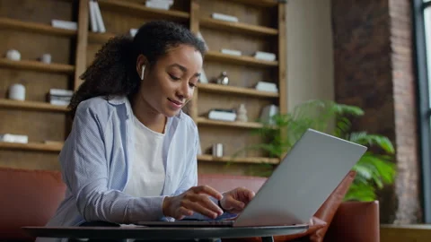 Student Working On Laptop In Lounge Stock Footage 333672634
