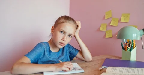 Student working in notebook. Dolly shot Stock Footage 86280619