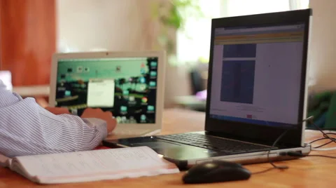 Student Working On Two Laptops At Once Stock-Footage 40746240