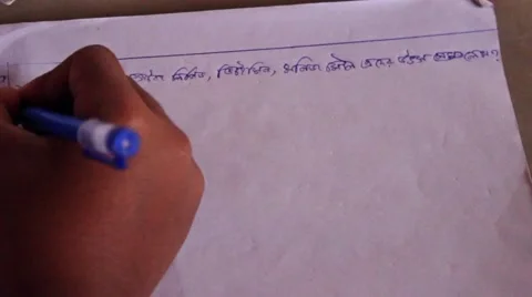 Student writes in Bengali seen from above village school India Stock Footage 45181811