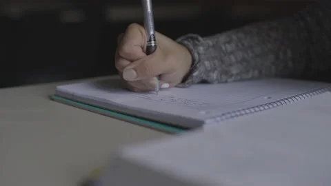 Student Writes In Notebook 스톡 동영상 208720142