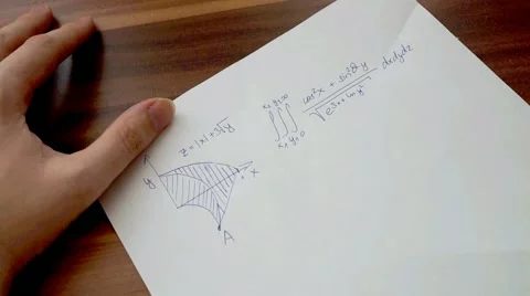 Student is writing and solving difficult mathematical equation in math exam. Stock Footage