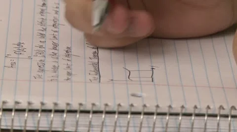 Student writing in notebook  (2 of 2) Stock Footage 10328998