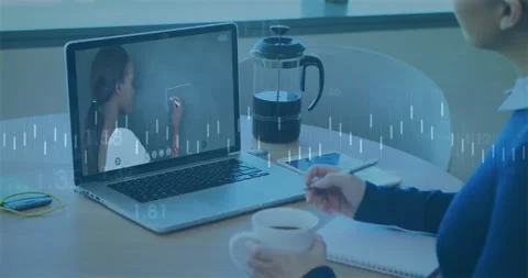 Student writing notes with mug joining lesson, viewing teacher drawing diagram Stock Footage 329854770