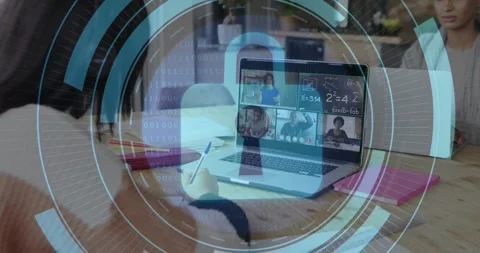 Student writing notes at table while software activating HUD and locking laptop Stock Footage 330209230