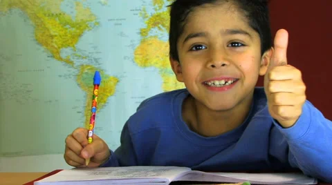 Student Writing Smiling in Classroom School HD Video stock 40715184