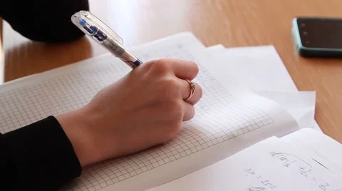 Student wrote pen in notebook Stock Footage 50959178