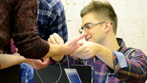Students adjust the computer during Data Science Hackathon in Kiev, Ukraine. Video stock 72081314