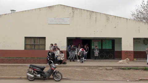 Students And Parents Outside Public Elementary School Entrance Building Stock Footage 344416033