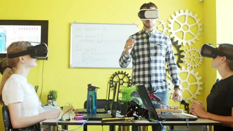 Students and teacher using VR goggles in classroom Stock Footage 140762228