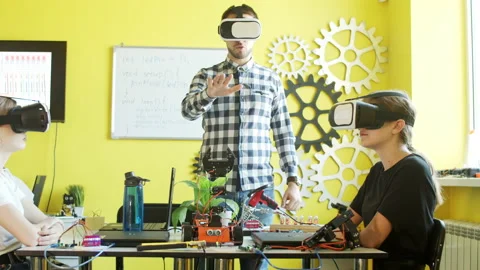 Students and teacher using VR goggles in classroom Stock Footage 140766147