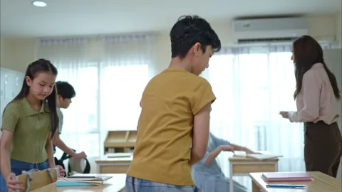 Students and teachers during the time students enter the classroom Stock Footage 309904283