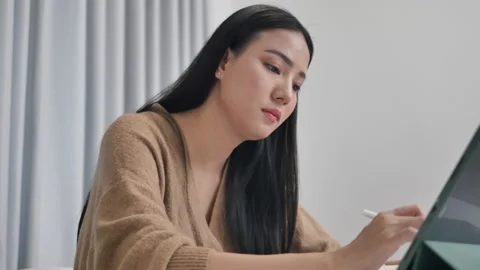 Students are confident in distance learning by looking at their laptop screens.  Stock Footage 197481278