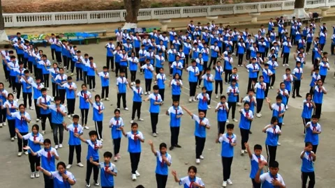 Students are dancing in the school yard Stock Footage 238873108