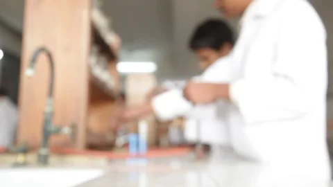 Students are performing science experiments in school lab. Stock-Footage 114479590