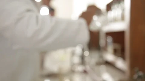 Students are performing science experiments in school lab. Stock-Footage 114479605