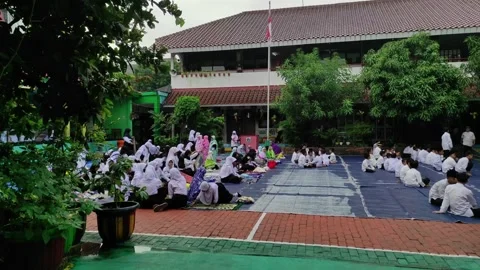 Students are preparing for a Friday pray Stock Footage 262387628