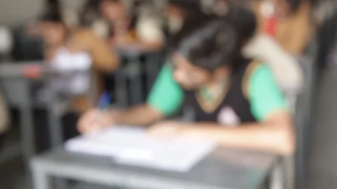 Students are taking exams or studying in a class room. Stock-Footage 113691855