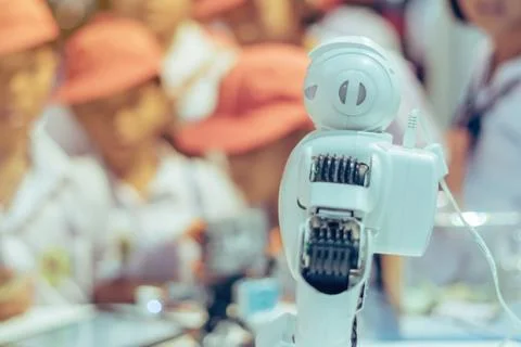 Students are testing robot control in an elementary school laboratory. 스톡 사진