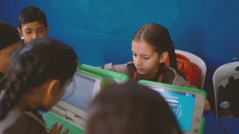 Students are using laptops in a classroom setting in Karachi Pakistan They are Stock Footage 330873090