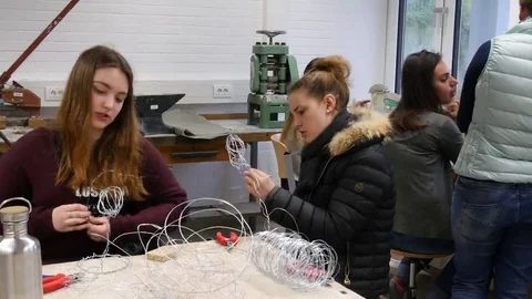 Students in art class create a work of art Stock Footage 69301719